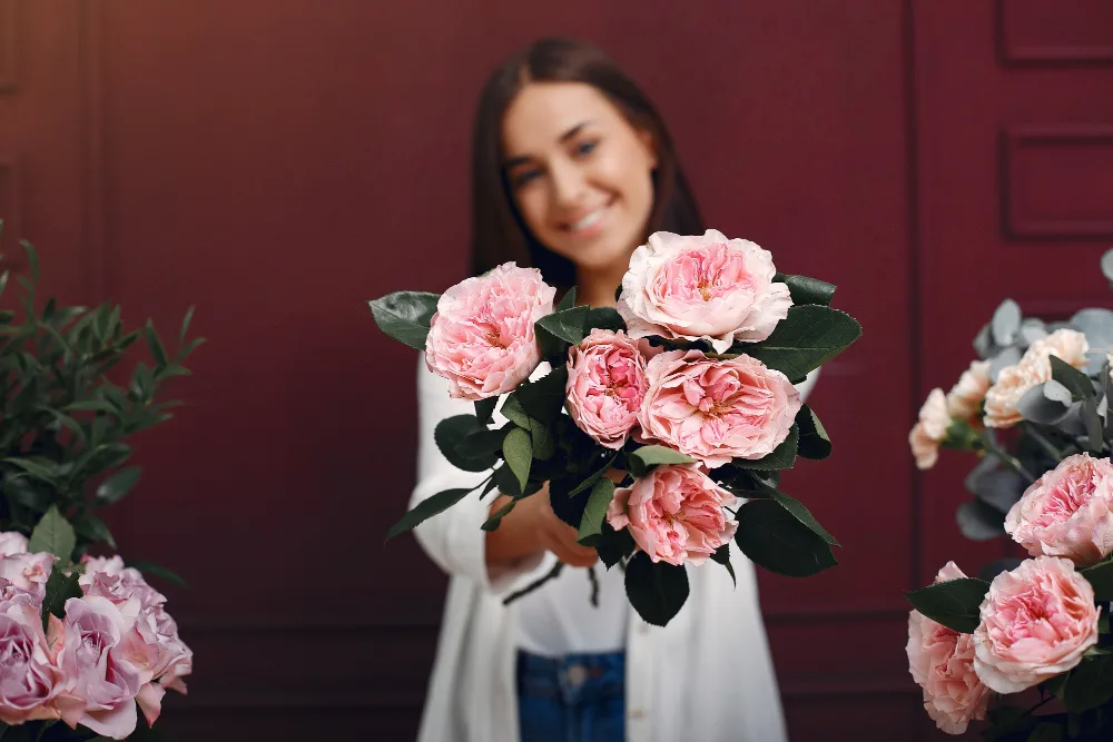 lady with peony flowers